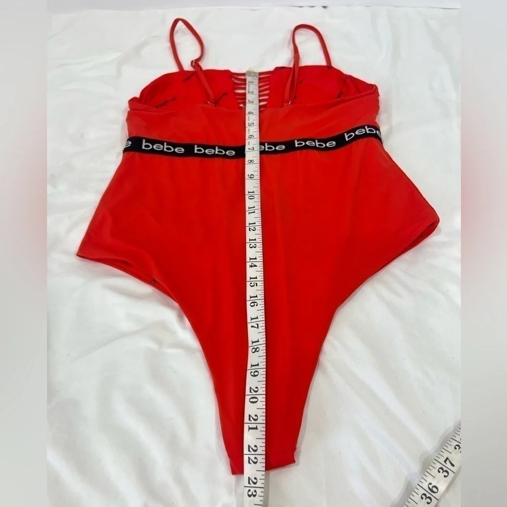 Bebe blood orange red swimsuit black band with logo size XL